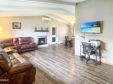 Living - 703 14th St W, Williston, ND 58801 photo 1 of 3