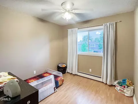 Bedroom - 703 14th St W, Williston, ND 58801 photo 2 of 5