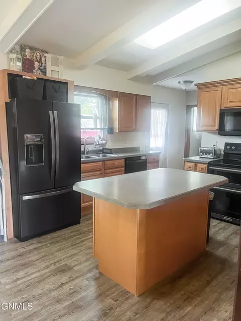 Kitchen - 703 14th St W, Williston, ND 58801 photo 3 of 3