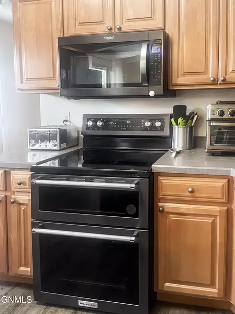 Kitchen - 703 14th St W, Williston, ND 58801 photo 2 of 3