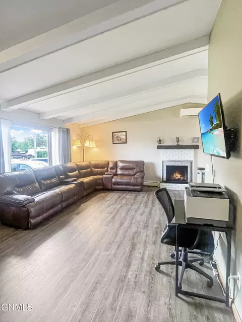 Living - 703 14th St W, Williston, ND 58801 photo 2 of 3