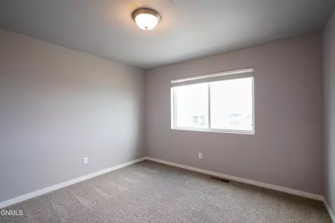 Bedroom - 603 Cobblestone Loop SW, Mandan, ND 58554 photo 3 of 4