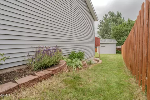 Exterior - 4643 Kost Dr, Bismarck, ND 58503 photo 4 of 7