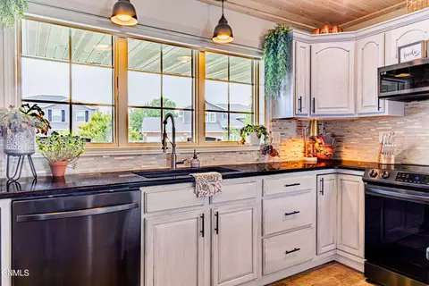 Kitchen - 2235 La Corte Loop, Bismarck, ND 58503 photo 4 of 10