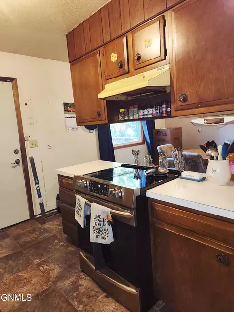 Kitchen - 12118 Johnathan Ave, Menoken, ND 58558 photo 2 of 3