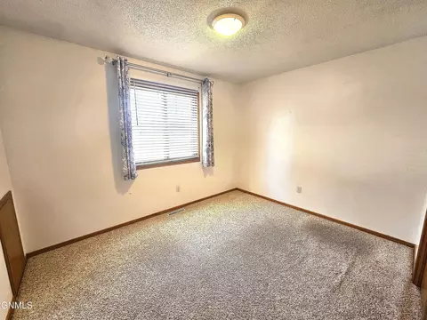 Bedroom - 67 17 St E, Dickinson, ND 58601 photo 2 of 4