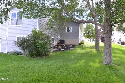Exterior - 802 Division St NE, Mandan, ND 58554 photo 4 of 12