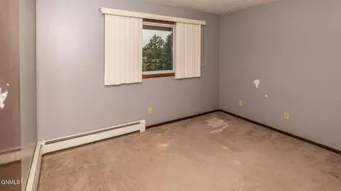 Bedroom - 121 Interstate Ave E, Bismarck, ND 58503 photo 14 of 14