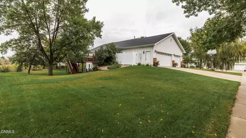 Exterior - 609 Huron Dr, Bismarck, ND 58503 photo 4 of 8