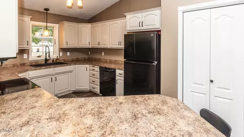 Kitchen - 609 Huron Dr, Bismarck, ND 58503 photo 2 of 3
