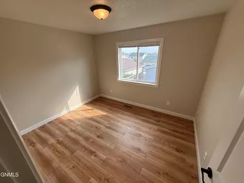 Bedroom - 1825 28th St W, Williston, ND 58801 photo 3 of 8
