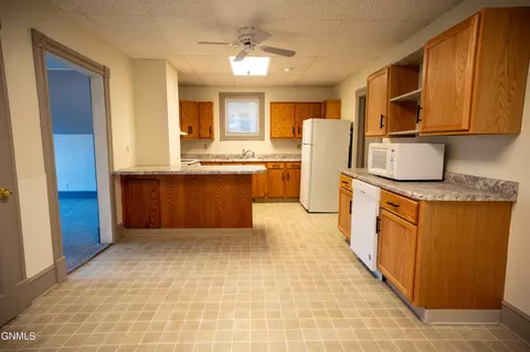 Kitchen - 240 3rd St W, Dickinson, ND 58601 photo 1 of 7