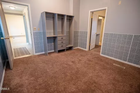 Bedroom - 240 3rd St W, Dickinson, ND 58601 photo 6 of 8