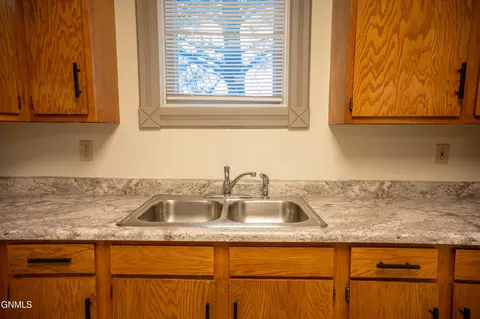 Kitchen - 240 3rd St W, Dickinson, ND 58601 photo 5 of 7