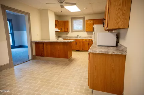 Kitchen - 240 3rd St W, Dickinson, ND 58601 photo 7 of 7