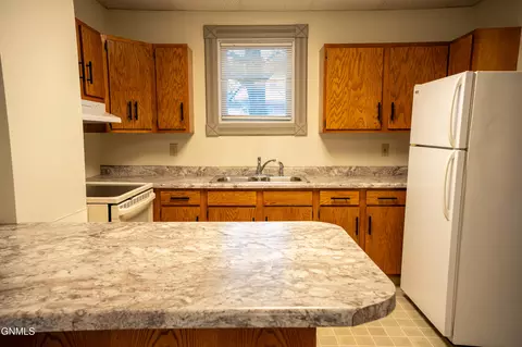 Kitchen - 240 3rd St W, Dickinson, ND 58601 photo 2 of 7