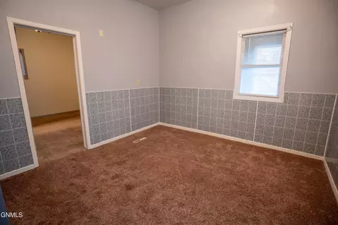 Bedroom - 240 3rd St W, Dickinson, ND 58601 photo 5 of 8
