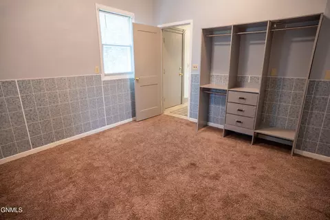 Bedroom - 240 3rd St W, Dickinson, ND 58601 photo 7 of 8