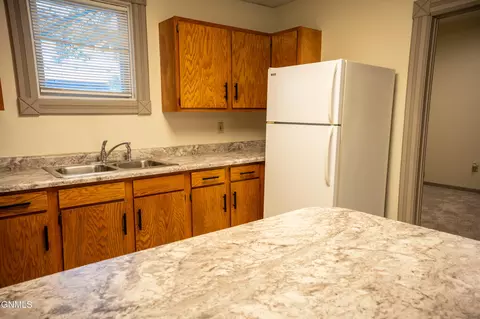 Kitchen - 240 3rd St W, Dickinson, ND 58601 photo 4 of 7