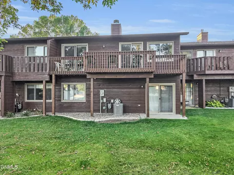 Exterior - 435 Brandon Dr E, Bismarck, ND 58503 photo 8 of 12