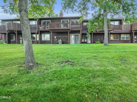 Exterior - 435 Brandon Dr E, Bismarck, ND 58503 photo 7 of 12