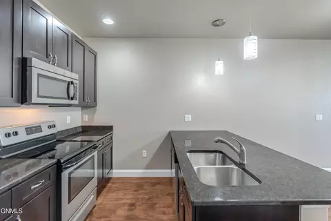 Kitchen - 809 Canada Ave, Bismarck, ND 58501 photo 4 of 8