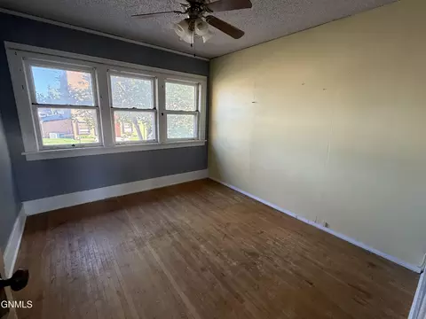 Bedroom - 913 Main St, Williston, ND 58801 photo 2 of 3
