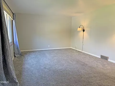 Living - 1919 Assumption Dr, Bismarck, ND 58501 photo 2 of 8