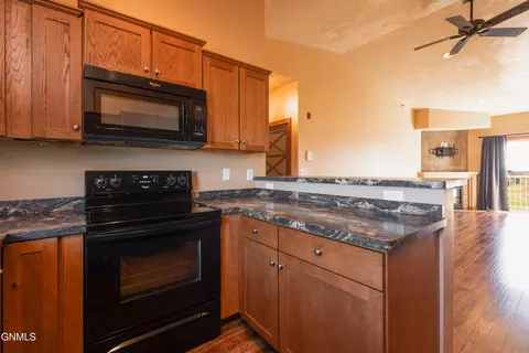Kitchen - 120 Santee Rd, Bismarck, ND 58504 photo 2 of 2