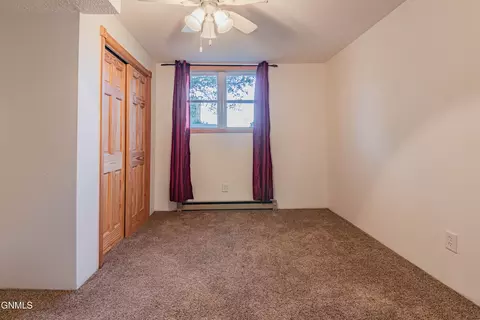 Bedroom - 1444 1st Ave E, Dickinson, ND 58601 photo 9 of 13