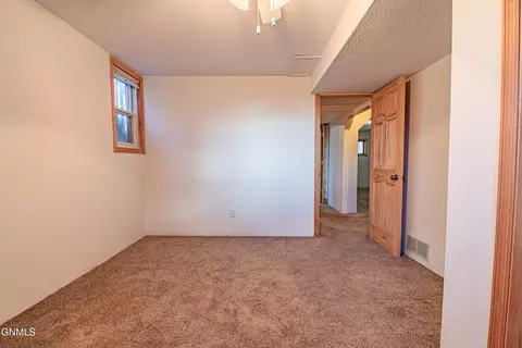 Bedroom - 1444 1st Ave E, Dickinson, ND 58601 photo 10 of 13