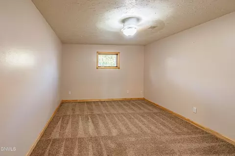 Bedroom - 1444 1st Ave E, Dickinson, ND 58601 photo 7 of 13