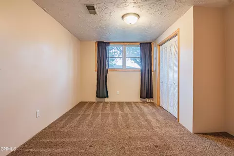 Bedroom - 1444 1st Ave E, Dickinson, ND 58601 photo 11 of 13