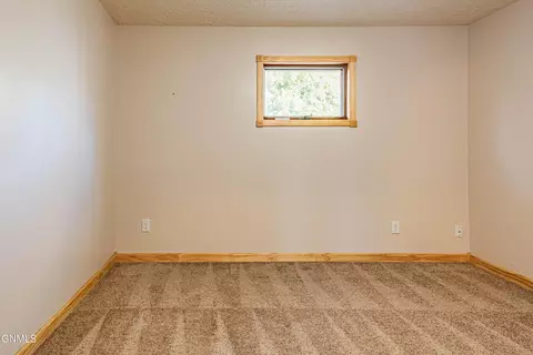 Bedroom - 1444 1st Ave E, Dickinson, ND 58601 photo 8 of 13