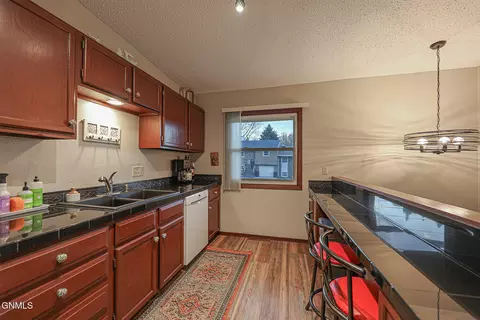 Kitchen - 515 Marilyn Dr NW, Mandan, ND 58554 photo 3 of 5