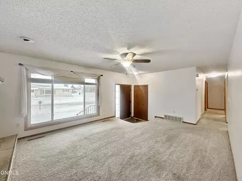 Living - 901 6th St W, Williston, ND 58801 photo 2 of 2