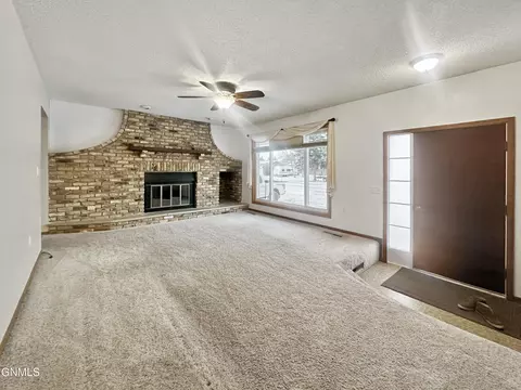 Living - 901 6th St W, Williston, ND 58801 photo 1 of 2
