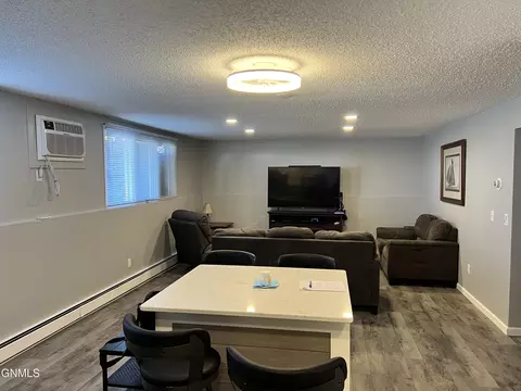 Living - 701 Interstate Ave E, Bismarck, ND 58503 photo 1 of 5