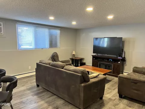 Living - 701 Interstate Ave E, Bismarck, ND 58503 photo 3 of 5