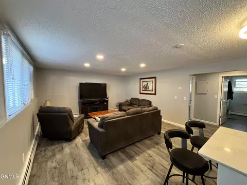Living - 701 Interstate Ave E, Bismarck, ND 58503 photo 2 of 5