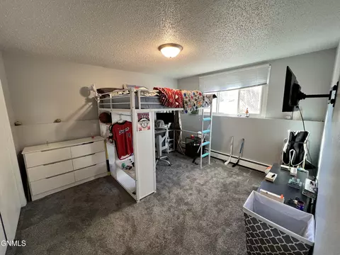 Bedroom - 701 Interstate Ave E, Bismarck, ND 58503 photo 2 of 3