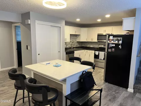 Kitchen - 701 Interstate Ave E, Bismarck, ND 58503 photo 6 of 6