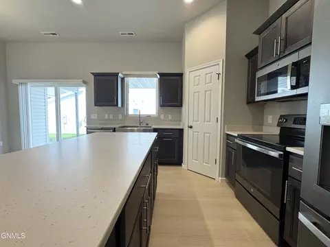 Kitchen - 110 Kenner Loop, Bismarck, ND 58504 photo 3 of 6