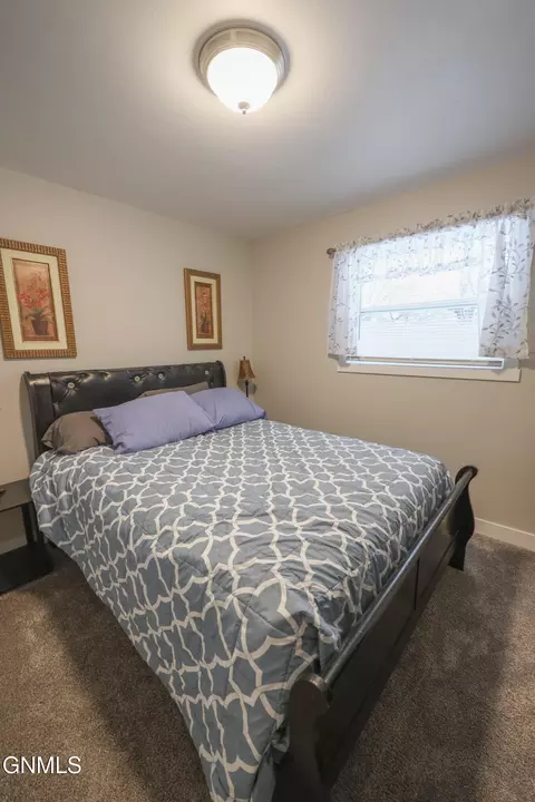 Bedroom - 1208 13th Ave W, Williston, ND 58801 photo 3 of 4