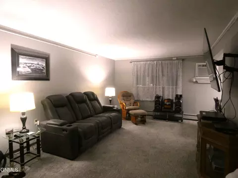 Living - 607 Interstate Ave E, Bismarck, ND 58503 photo 1 of 4