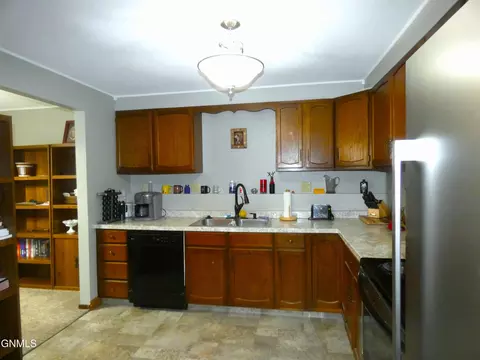 Kitchen - 607 Interstate Ave E, Bismarck, ND 58503 photo 1 of 2