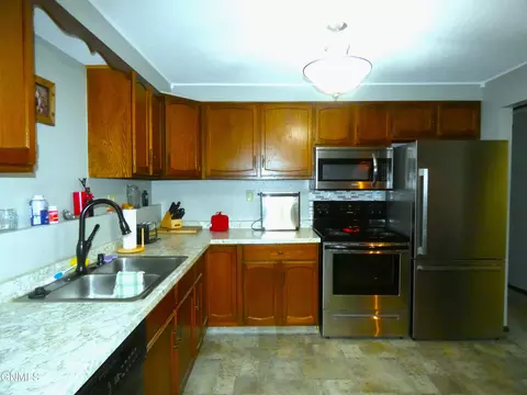 Kitchen - 607 Interstate Ave E, Bismarck, ND 58503 photo 2 of 2