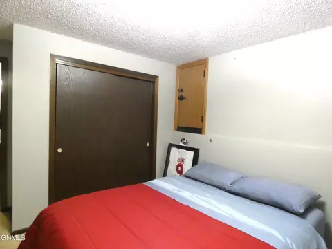 Bedroom - 607 Interstate Ave E, Bismarck, ND 58503 photo 4 of 5