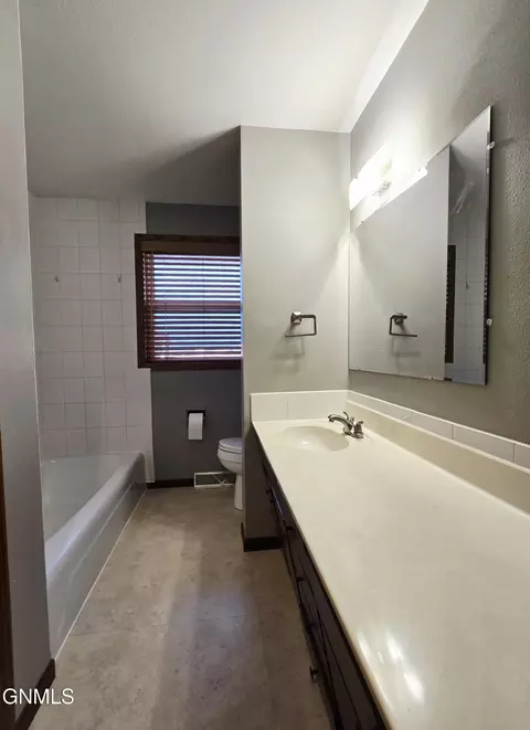 Bath - 512 Gary Ave, Bismarck, ND 58501 photo 1 of 2