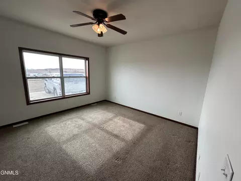 Bedroom - 4464 146w Ave NW, Williston, ND 58801 photo 2 of 8